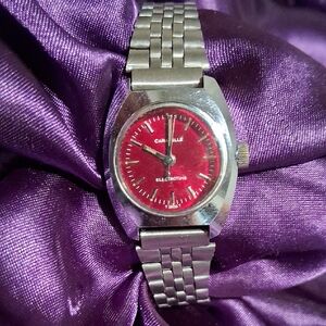 Caravelle watch with Red Dial and Silver Band